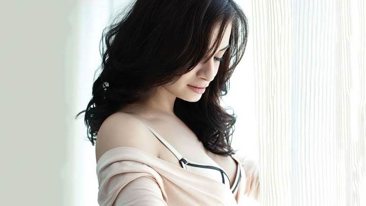 Dia Mirza Looking Down Side Pose